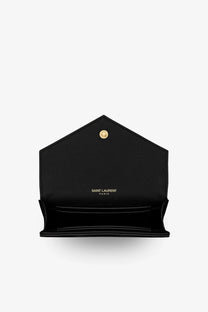 Black leather Saint Laurent women’s Cassandre metalassé wallet with gold-tone clasp and interior card slots