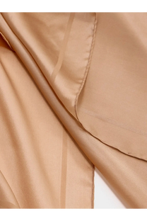 Saint Laurent women’s cassandre beige silk scarf with delicate stitching along its soft edges