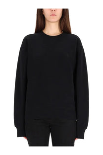Saint Laurent women’s black oversized crewneck sweatshirt with subtle embroidered logo on left chest