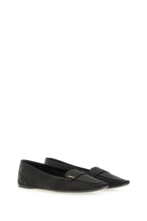 Saint Laurent women’s black suede loafers with gold-tone YSL logo front detail in crepe satin poppy ballerina style