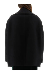 Saint Laurent women’s double breasted wool caban black coat with structured collar and minimalist design front view