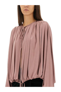 Saint Laurent women’s blue fluid knit blouse with a soft mauve satin gathered neckline and long flowing sleeves