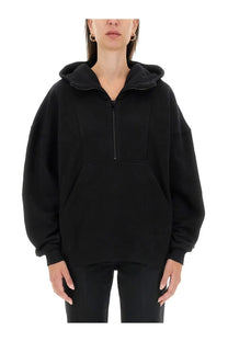 Saint Laurent women’s black oversized zip-front hoodie with relaxed fit and ribbed cuffs in cotton blend material