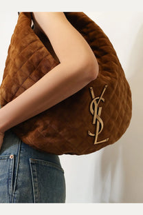 Brown quilted suede Saint Laurent womens Icare hobo shoulder bag with gold tone logo in beige color