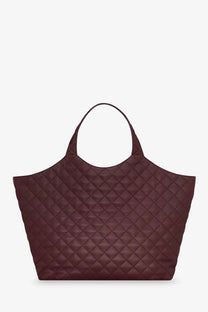 Saint Laurent women’s icare quilted leather tote bag in burgundy with diamond stitching and rounded top handles