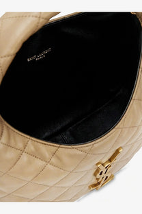 Beige quilted leather Saint Laurent women’s icarino handbag with gold-tone YSL logo clasp and black interior lining