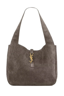 A sleek gray suede saint laurent women’s le à bea bag with a gold tone ysl logo clasp