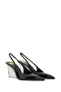 Saint Laurent women’s black leather Miller slingback pumps with patent leather and transparent wedge heel viewed from back