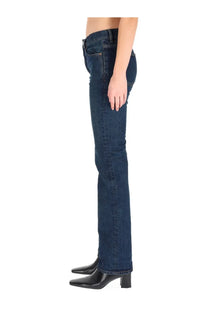 Dark blue denim straight-leg Saint Laurent women’s low waist jeans with classic stitching in Nico Blue color