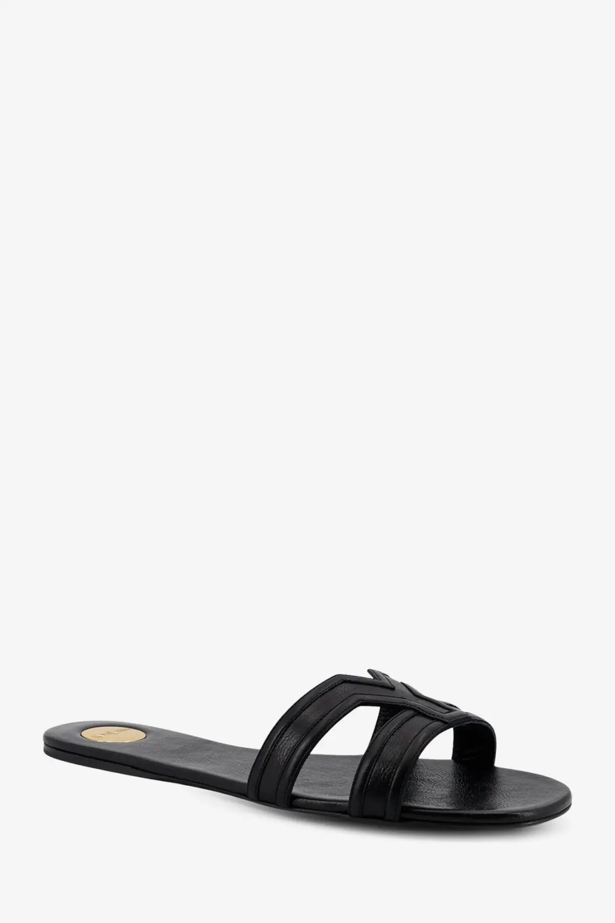 Saint Laurent women’s Mabrouka black leather slide sandal with minimalist design and small gold logo on the insole