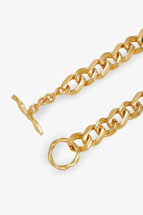 Saint Laurent women’s gold metal choker necklace with chunky chain and twisted t-bar clasp