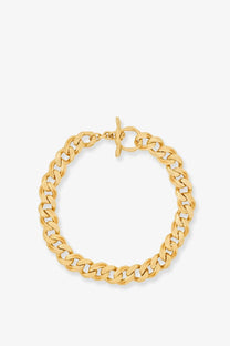 Saint Laurent women’s gold-toned metal curb chain bracelet with toggle clasp complements metal choker necklace