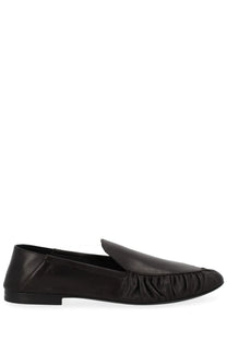 Saint Laurent women’s black leather moccasin loafer with ruched toe detail for stylish comfort