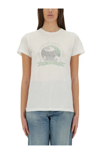 White cotton saint laurent women’s t-shirt with faded green and gray circular elephant logo for music festival