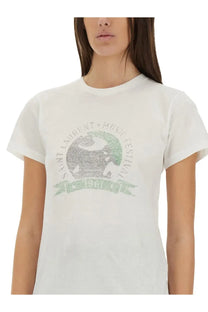 Saint Laurent women’s beige cotton t-shirt with faded green gray circular graphic for music festivals 1984