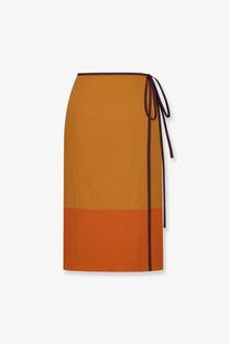 Saint Laurent women’s nylon pencil skirt gold with two-toned orange wrap design and dark brown waist tie