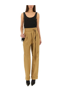 Tan high-waisted Saint Laurent womens Gurkha Serge beige trousers with self-tie belt and cuffed hems
