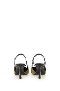 Saint Laurent women’s stone black slingback heels with gold-tone stud detailing on the sides