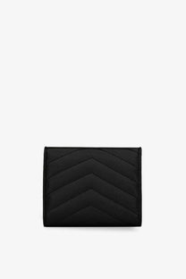 Saint Laurent women’s quilted leather wallet in black featuring a chevron pattern on the front side