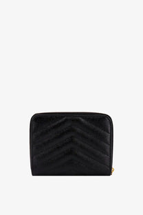 Saint Laurent women’s black quilted leather wallet with chevron pattern and gold-tone zipper closure