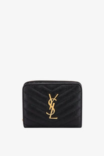 Black quilted leather Saint Laurent women’s wallet with gold-tone YSL logo front detail in elegant design