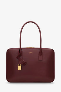 Saint Laurent women’s sac de jour red leather handbag with gold-tone hardware and detachable padlock tote bag
