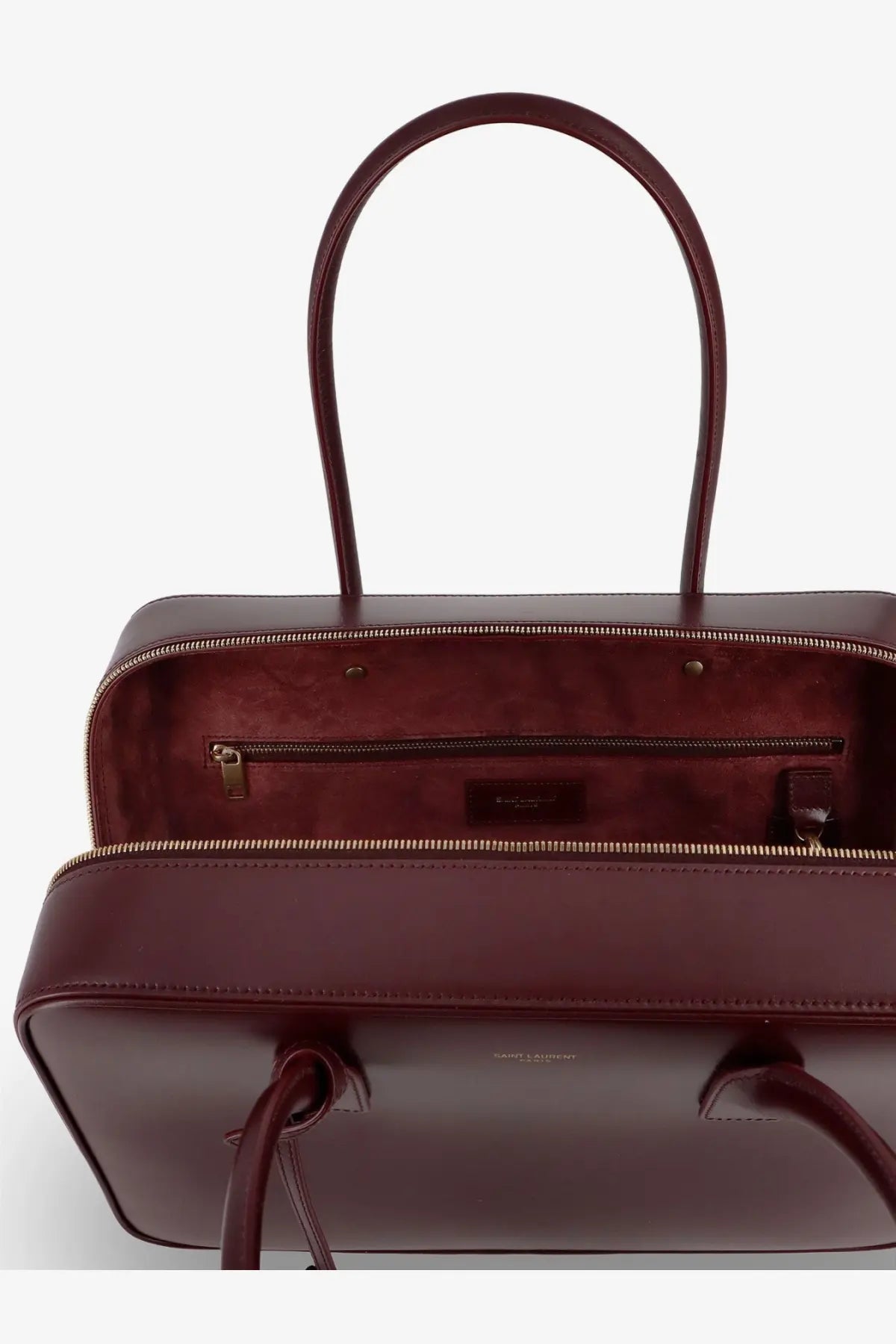 Saint Laurent women’s sac de jour leather tote bag in burgundy with structured rectangular shape and dual top handles