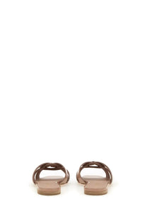 Saint Laurent women’s brown leather slide sandals with braided strap design in beige color