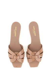 Beige patent leather saint laurent women’s mules with braided strap design nu pieds tribute sandal