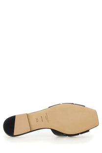 Black leather slide sandal with square toe and contrasting tan insole saint laurent women’s sandal nu pieds tribute black
