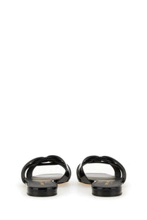 Saint Laurent women’s sandal black patent leather slide with sleek minimalist design and flat sole