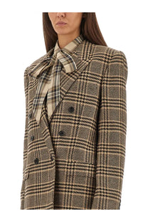 Saint Laurent women’s beige and black houndstooth wool blazer with plaid silk and cashmere bow tie collar