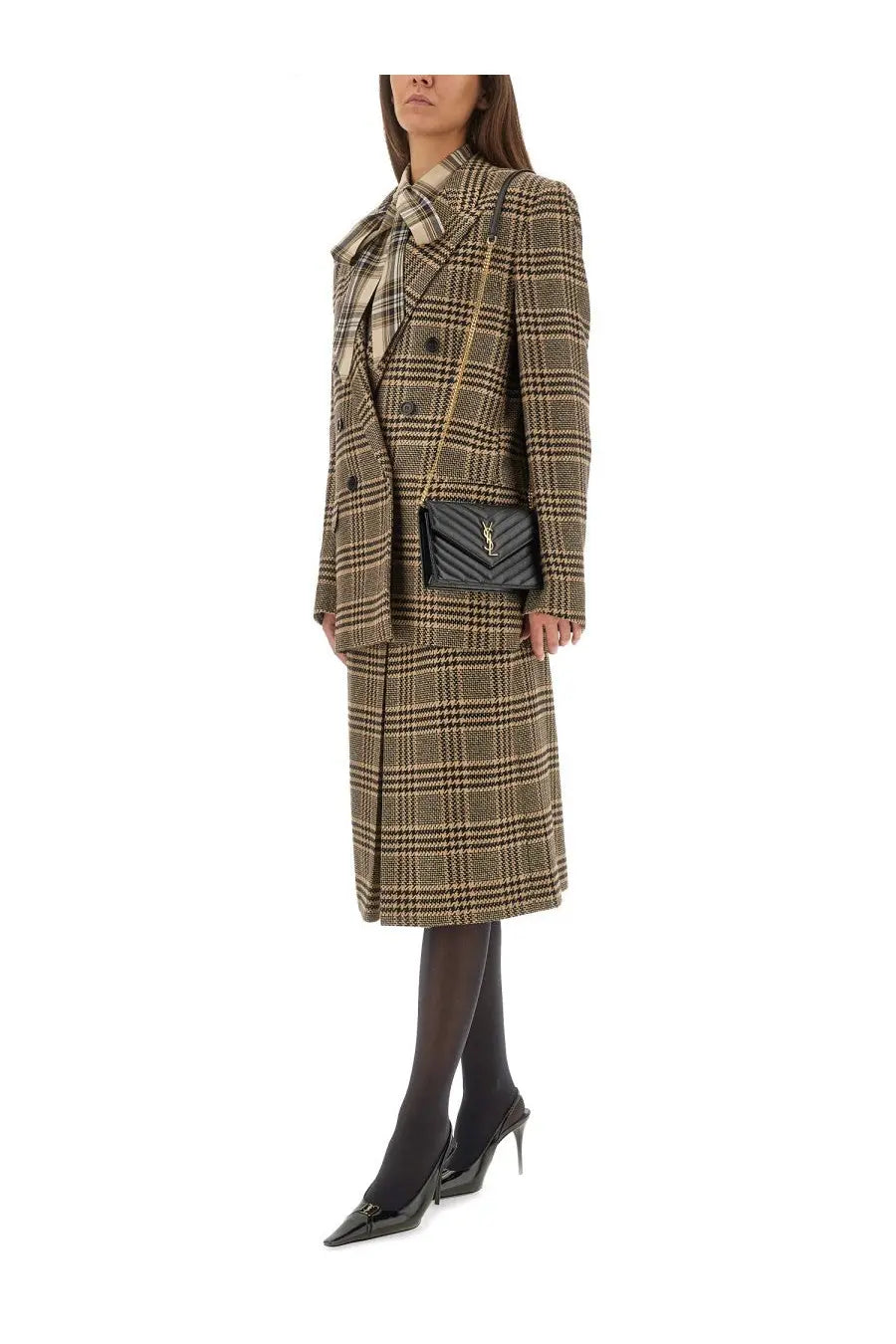 Black quilted leather crossbody bag with gold-tone ysl logo complementing saint Laurent women’s beige silk and cashmere jacket