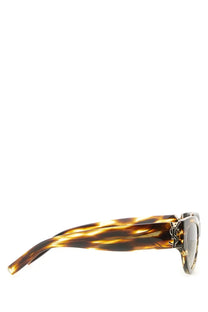 Saint Laurent Women’s SL M94 sunglasses in tortoiseshell pattern with sleek modern design and dark lenses brown frames