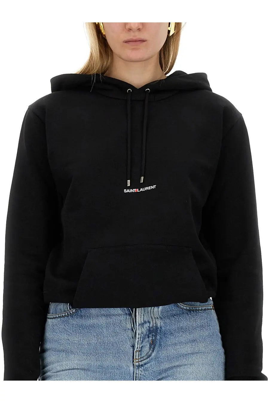 Saint Laurent women’s black cropped hoodie with small white and red logo on the chest made from soft cotton blend