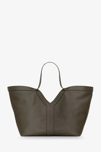 Saint Laurent women’s olive green leather tote bag with distinctive v-shaped front seam and slender handles