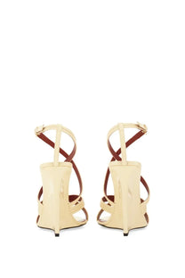 Saint Laurent women’s wedge sandal beige in cream patent leather with brown straps and a modern high-heel design