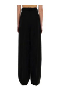 Saint Laurent women’s wide leg pants in grain de poudre black with a sleek tailored fit and subtle front pockets