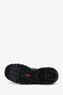 Black rubber sole with aggressive tread and small red logo on salomon men’s acs pro shell mesh sneakers heel