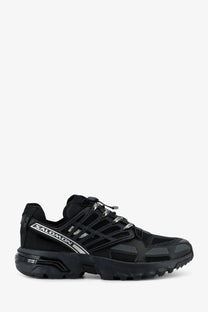 Salomon men’s acs pro shell mesh sneakers black with sleek mesh upper and bold silver branding accents for trail running