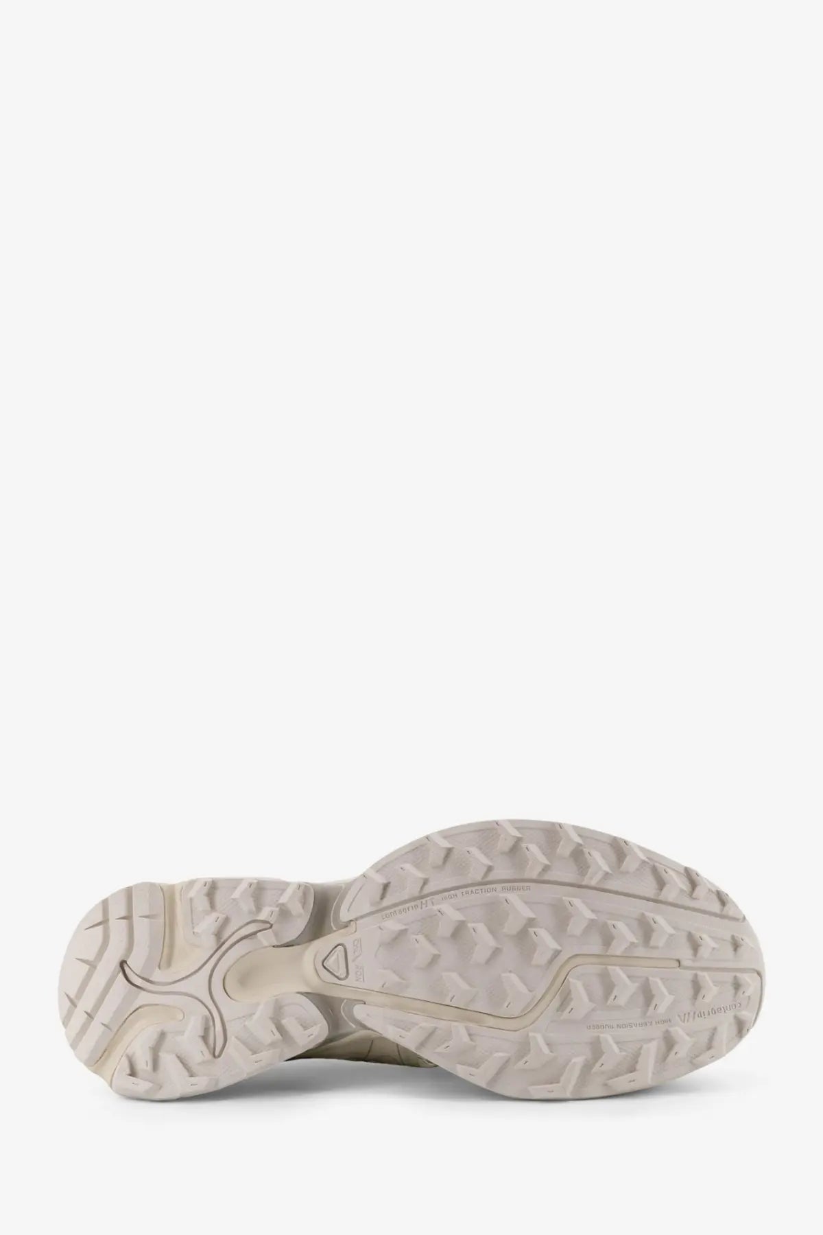 Beige rubber outsole with rugged textured tread on salomon men’s xt whisper void mesh and rubber sneakers white