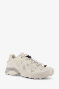 Cream-colored Salomon men’s XT Whisper Void mesh and rubber sneakers with breathable mesh upper and rugged outsole