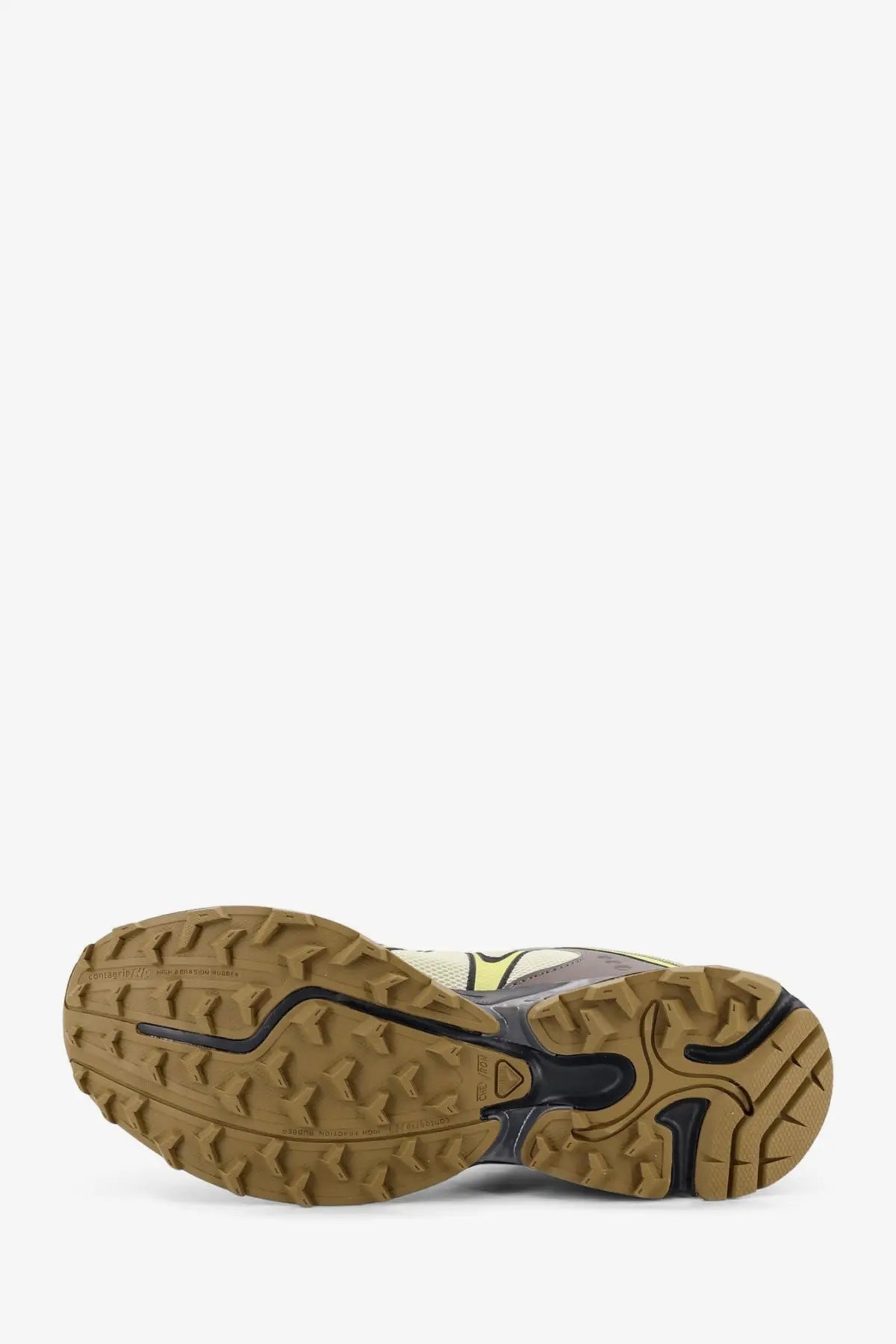 Tan rubber outsole with black accents and textured tread on salomon men’s xt whispext mesh sneakers asparg