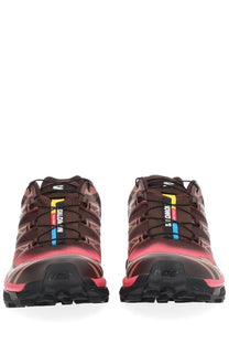 Salomon unisex skyline sneaker in brown and pink with a rugged textured design for trail running use