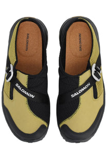 Salomon unisex slide nomad green yellow and black mesh slip-on sandals with white buckle strap and logo on both sides