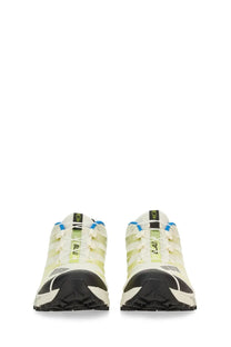 Cream-colored Salomon XA 3D trail running shoes with black and blue accents for unisex outdoor use