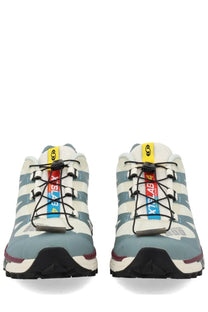 Salomon unisex sneaker multicolor featuring light blue and white xt-5 trail running shoes with black laces and rugged outsole