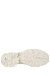 Cream-colored rubber sole of salomon unisex sneaker xt whisper void white with textured treaded pattern and molded design
