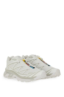 White salomon unisex sneaker xt with gray accents and colorful laces designed for trail running and outdoor use