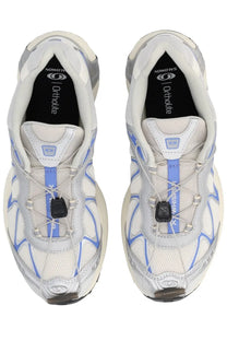 Salomon unisex XT Whisper sneaker grey featuring white and light blue mesh upper with black lacing and rubber outsole